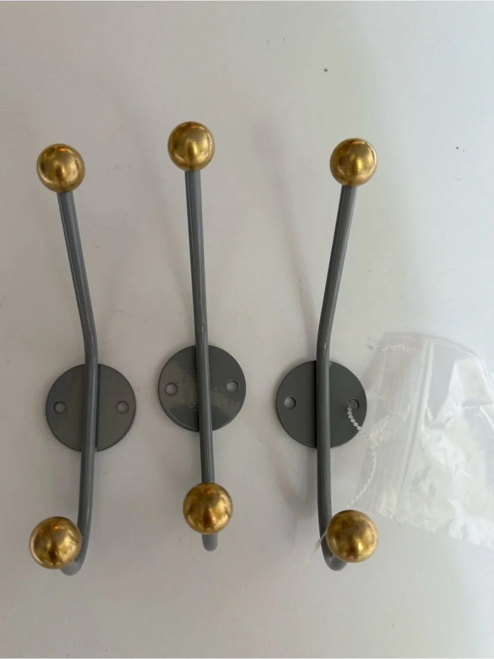 3 West Elm MCM coat hooks - gray with gold balls